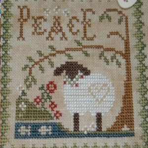 Cross-stitched Sheep by Sharron Renaud