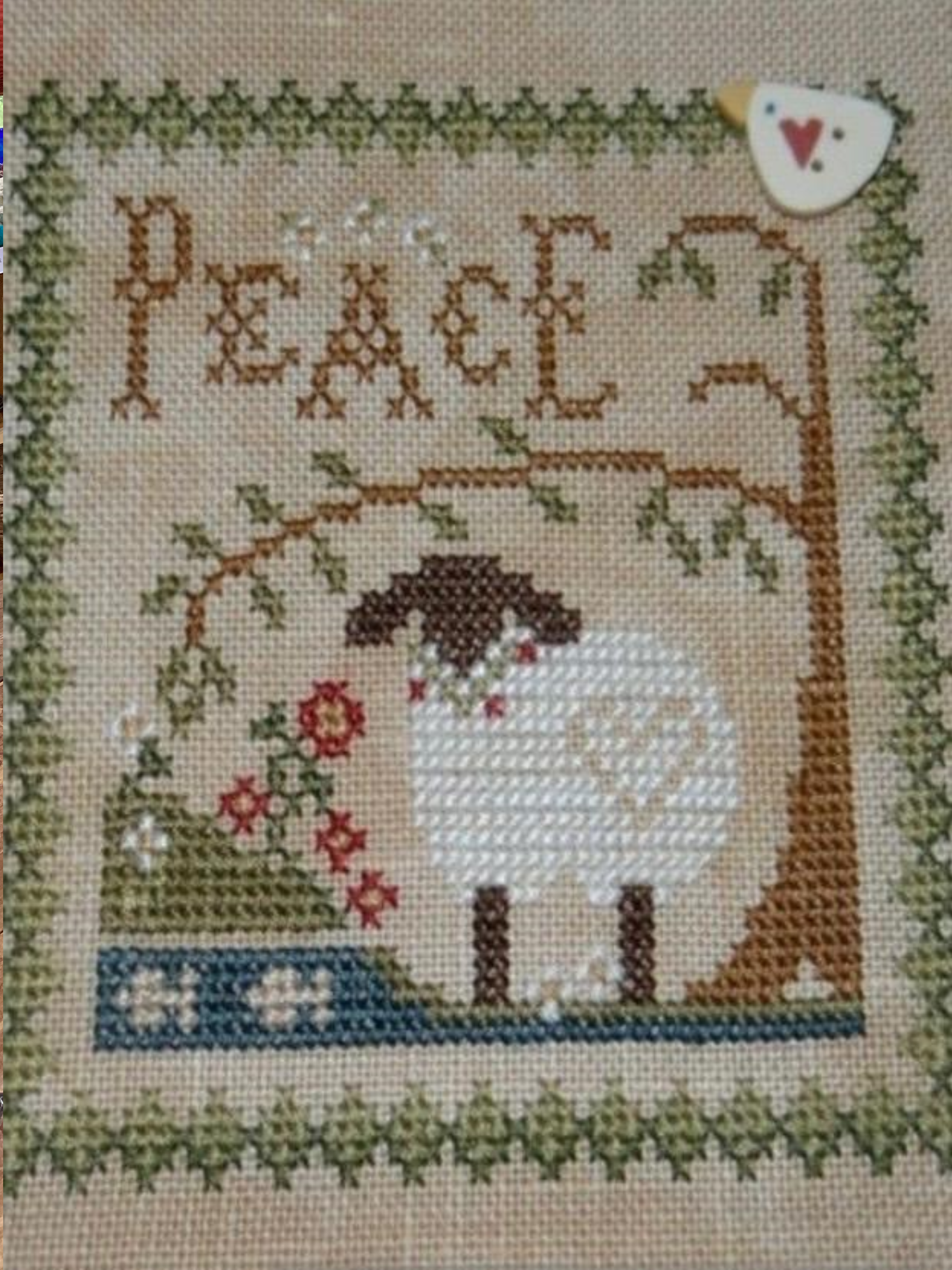 Cross-stitched Sheep by Sharron Renaud